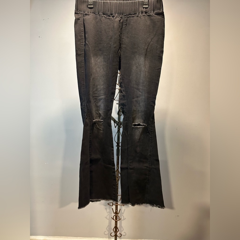 Black Flared Jeans with Distressed Details